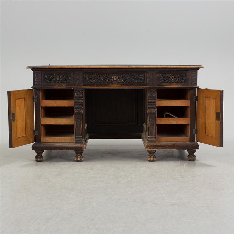 A Renaissance revival free standing writing desk, late 19th century.