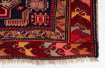 A semi-antique Anatolian runner, c. 409 x 159 cm.
