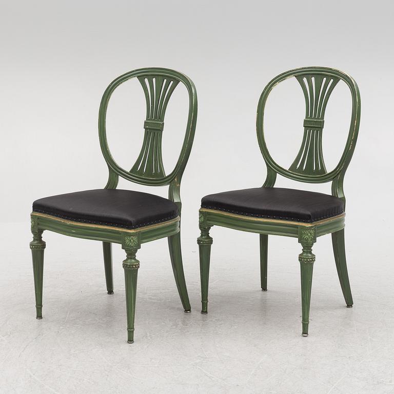 A Gustavian dining table with 8 chairs, Åmells, second half of the 20th century.