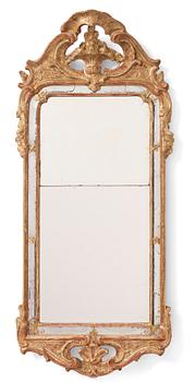A Swedish giltwood and carved rococo mirror, later part of the 18th century.