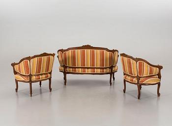 A SOFA AND A PAIR OF ARMCHAIRS, rococo style, end of 20th century.