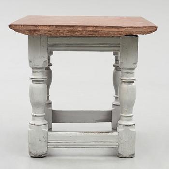 A limestone-top table, Sweden, 18th century.