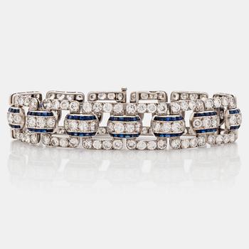 An Art Deco step cut sapphire and  old- cut diamond bracelet.