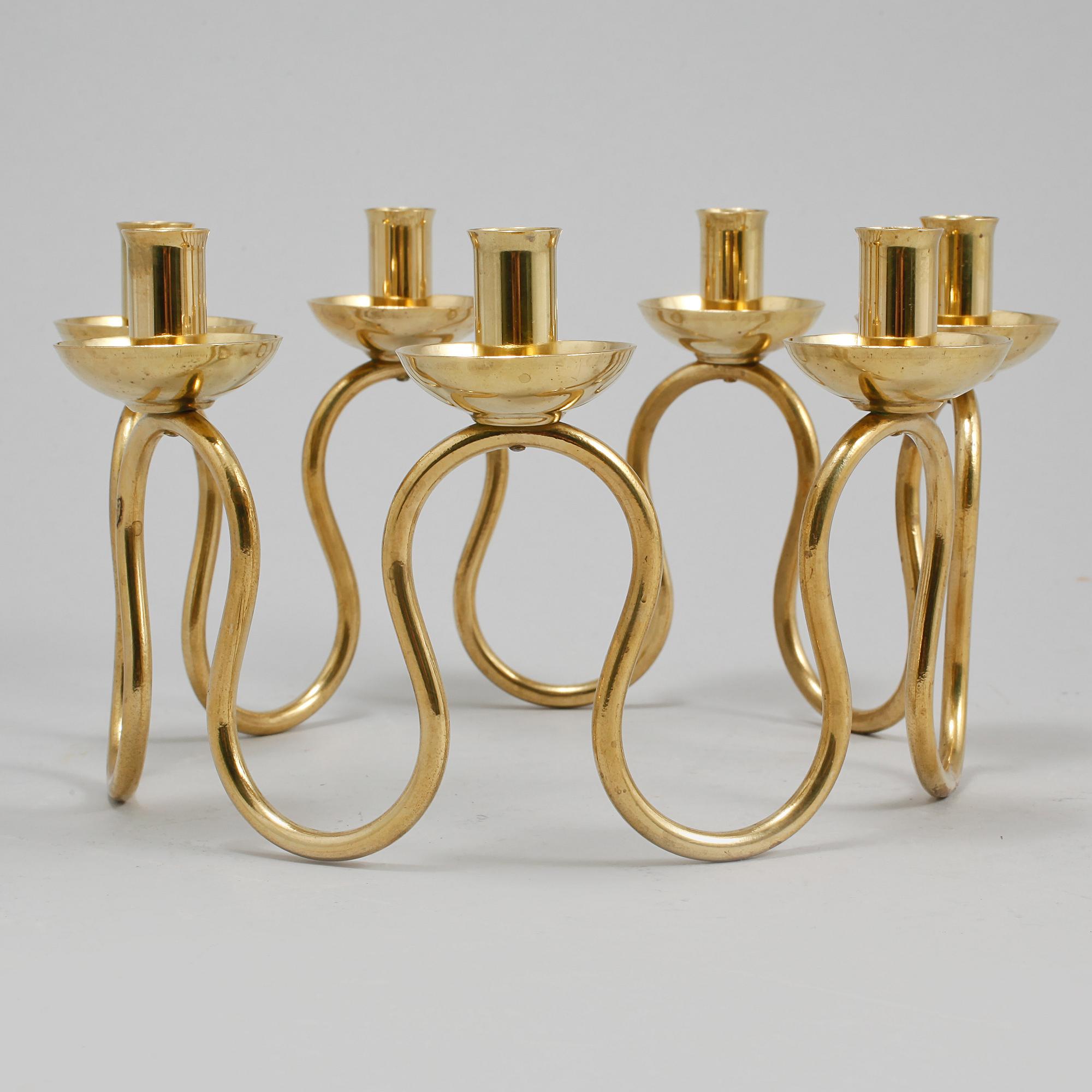 LJUSSTAKE, mässing, Lars Holmström, Arvika, 1900-talets andra hälft.