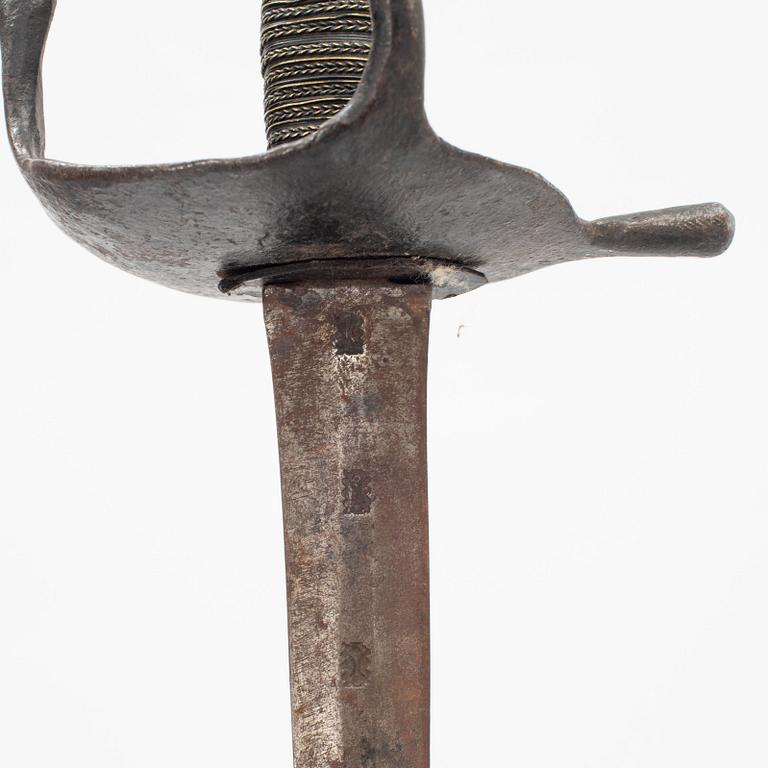 A Swedish Navy cutlass 1832 pattern.