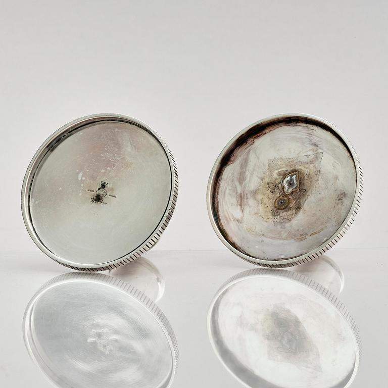 Georg Jensen, a pair of sterling silver candlesticks, design by Sigvard Bernadotte, model no 711A, Copenhagen, Denmark after 1945.