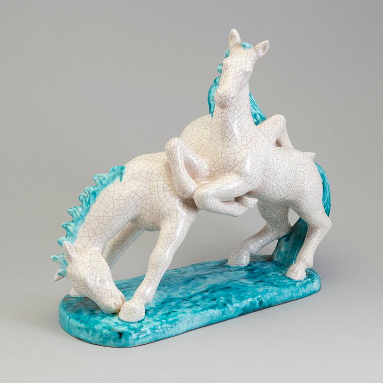 GOLDSCHEIDER, an earthenware craquelure glazed sculpture of horses, Austria.