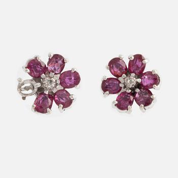 Earrings, one pair, white gold with rubies and small diamonds.