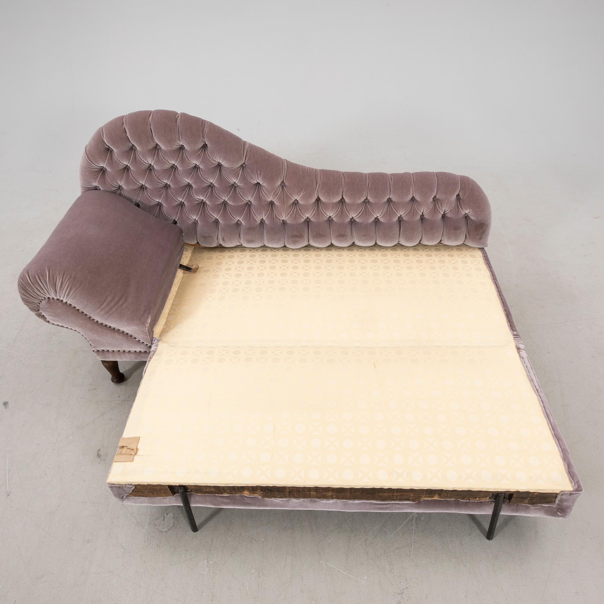 An early 1900s sofa/guest bed.