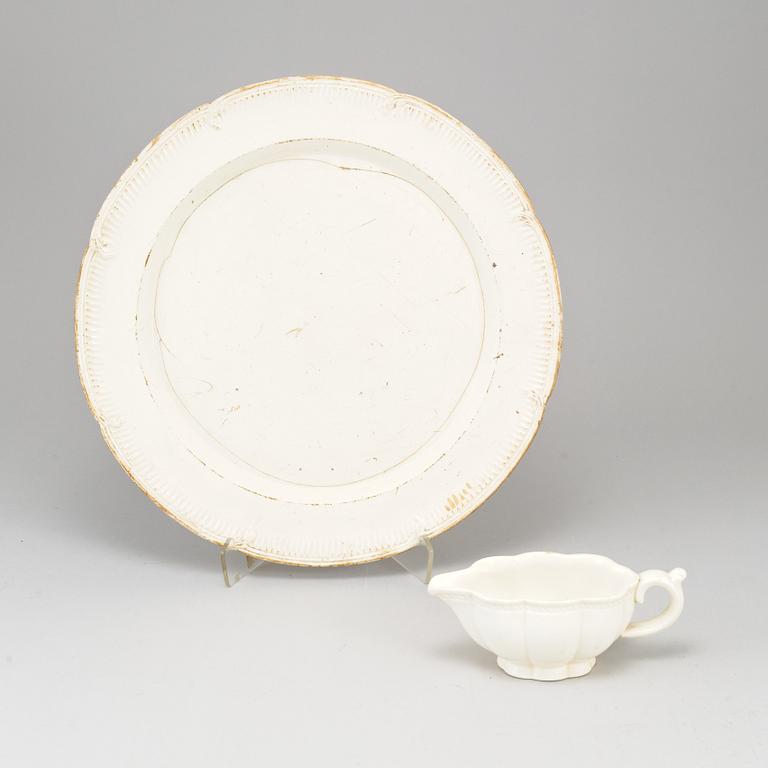 A Swedish Rörstrand creamware dish, end of 18th Century. And a white glazed creamer, probably 18th Century.