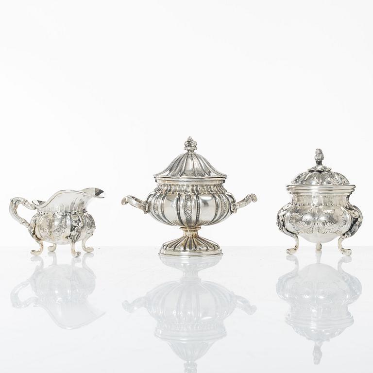 A silver sugar bowl and a set with creamer and sugar bowl, silver, 20th century.