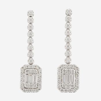 Earrings with baguette and brilliant cut diamonds.
