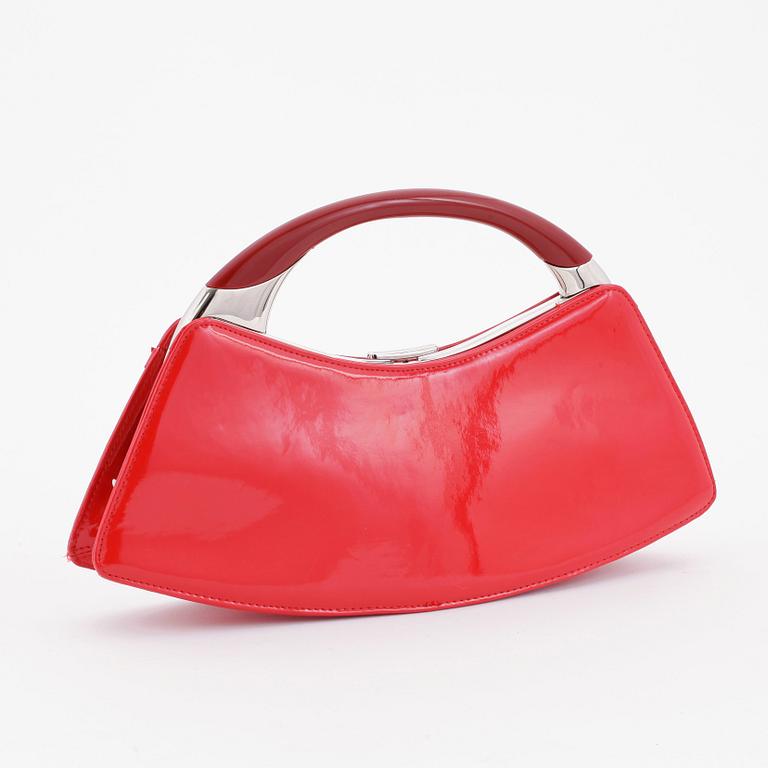 CHRISTIAN DIOR, a red patent leather handbag.