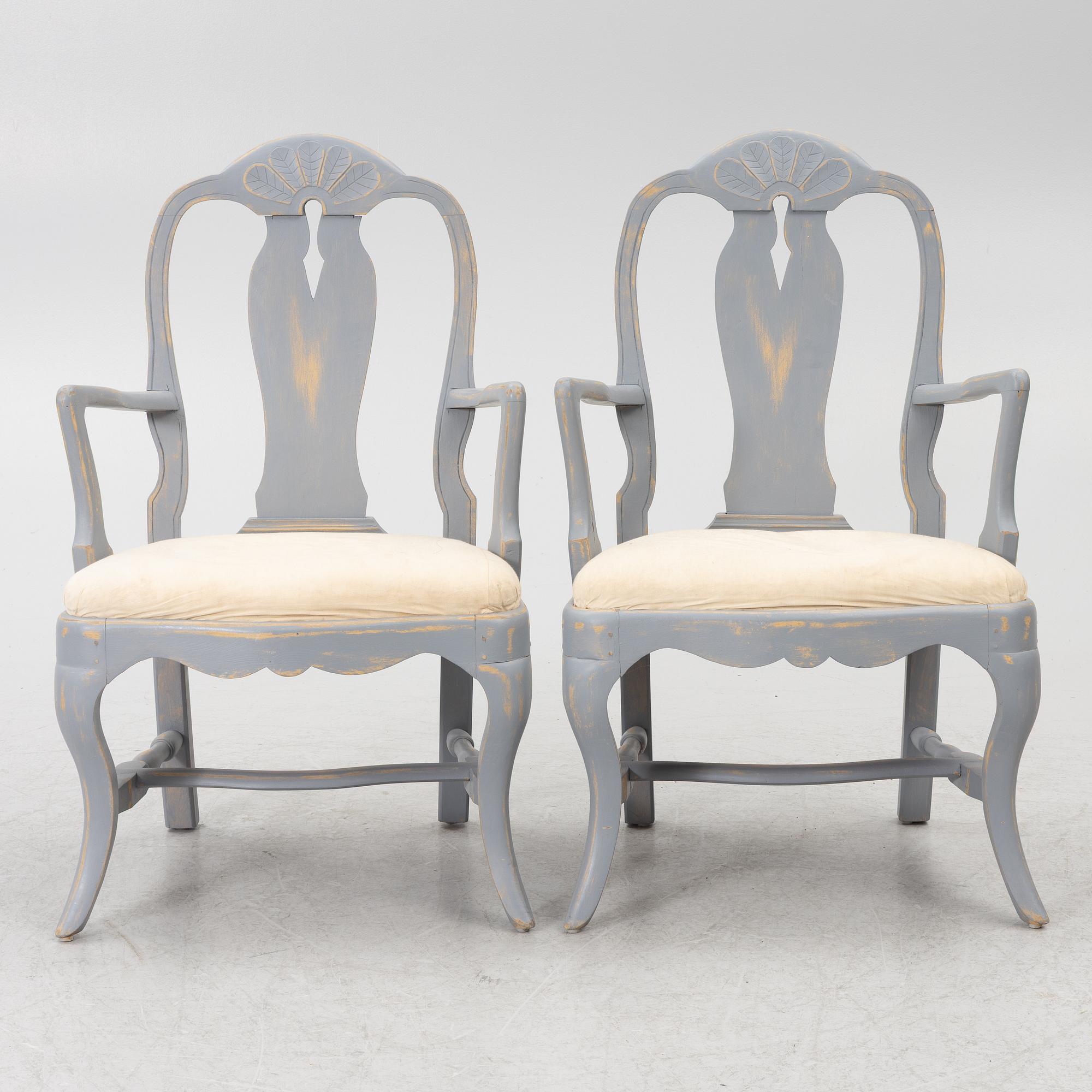 A pair of Rococo style armchairs, early 20th Century.