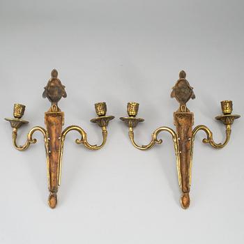 A pair of brass Louis XVI style wall sconces, 20th Century.