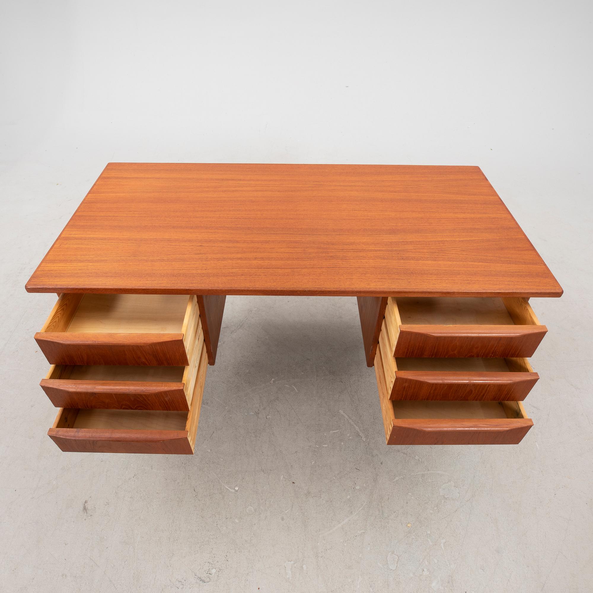 A 1950/60s teak desk.