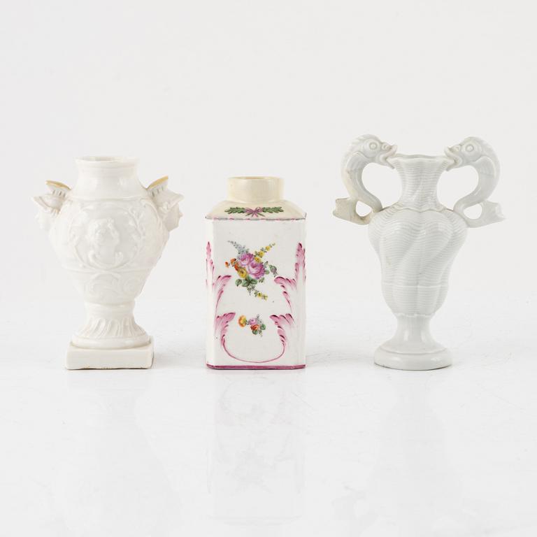 Two white glazed Nymphenburg vases and a Swedish Marieberg tea caddy, 18th Cenury.