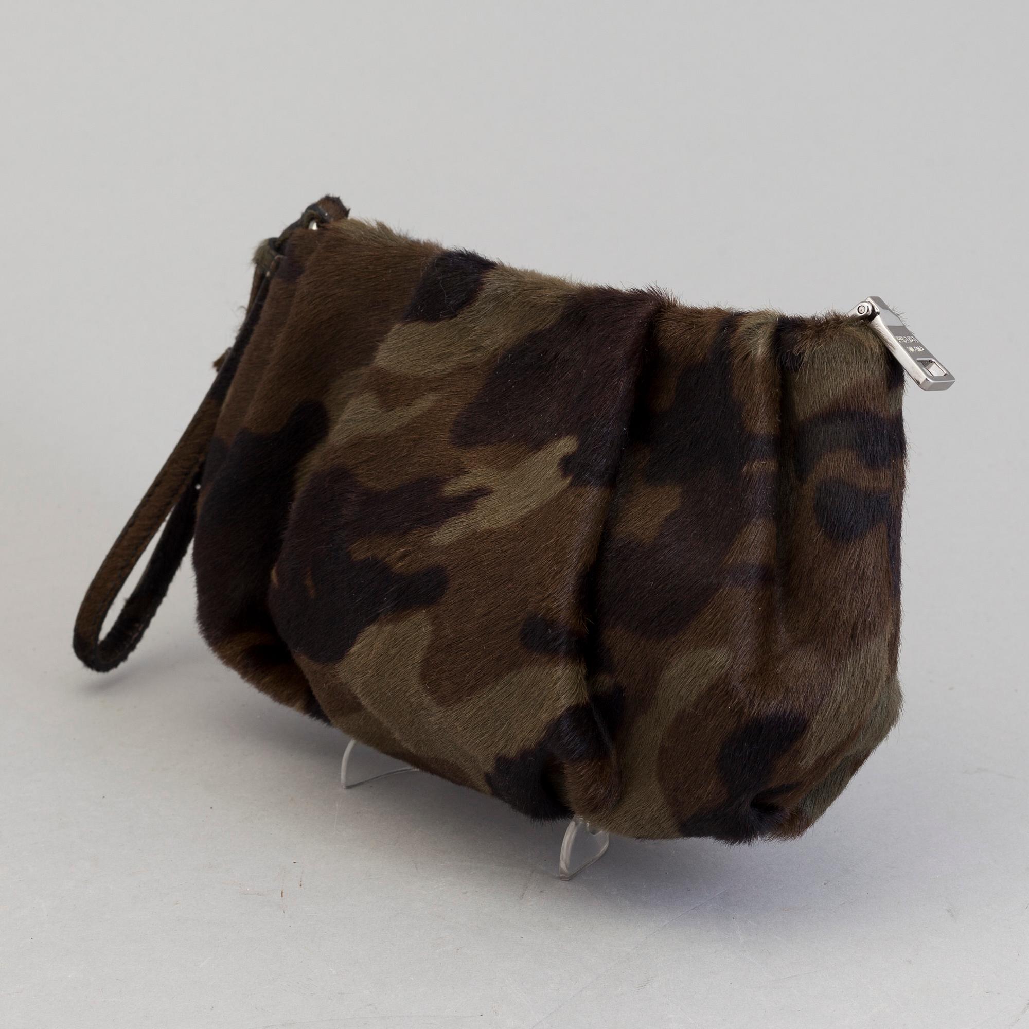 A ponyhair clutch by Prada.