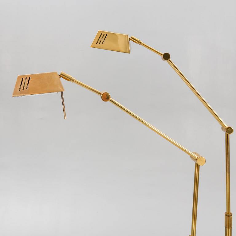 A pair of brass floor lamps 21st century.