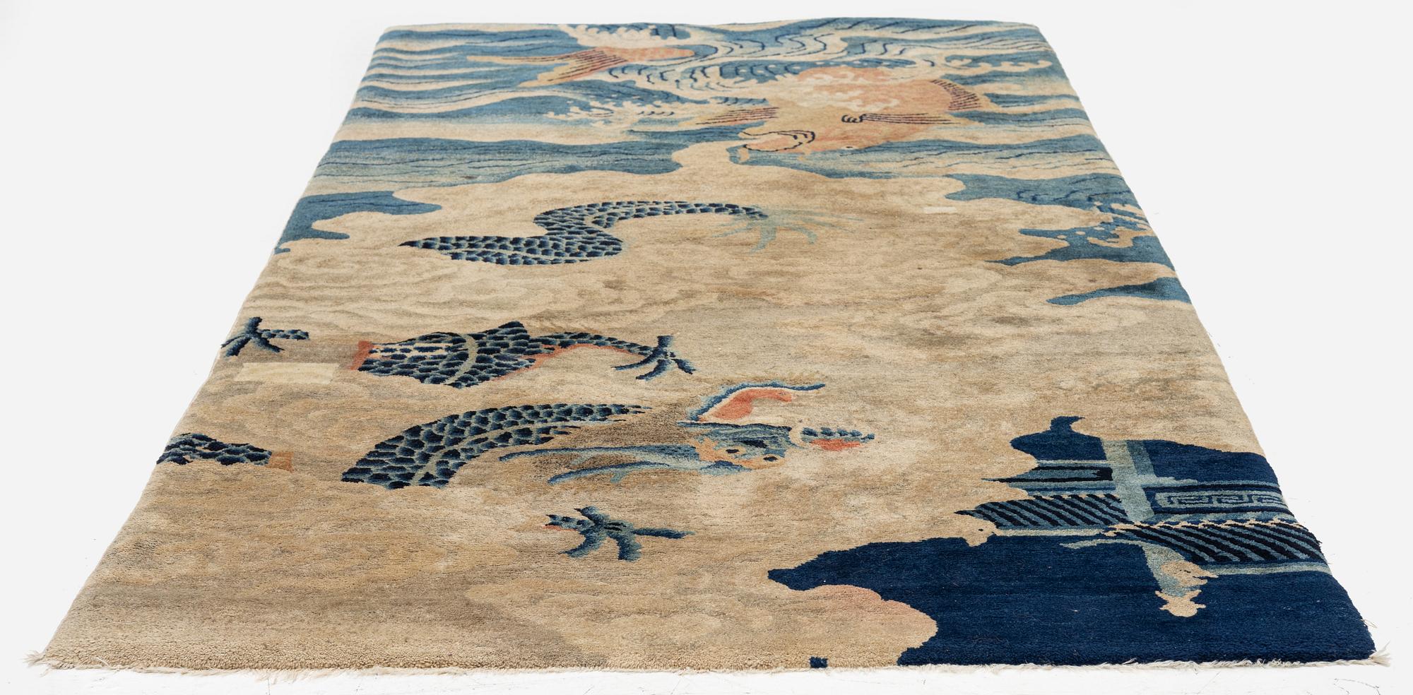 An antique Baotou rug, northern China, late Qing dynasty, circa 1900. c. 178x90 cm.