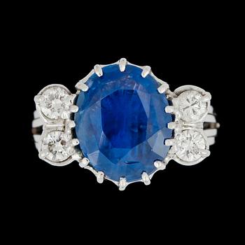 168. A sapphire and diamond, circa 0.40 ct, ring.