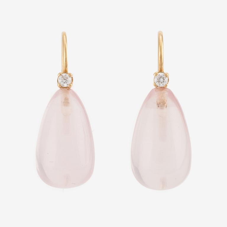 A pair of 18K gold earrings with rose quartz and round brilliant-cut diamonds.
