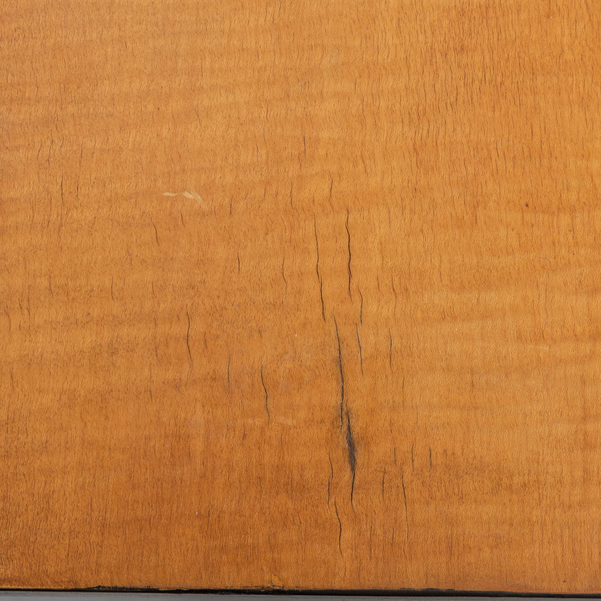Axel Einar Hjorth, attributed to. A walnut and birch desk, Nordiska Kompaniet, 1930's.