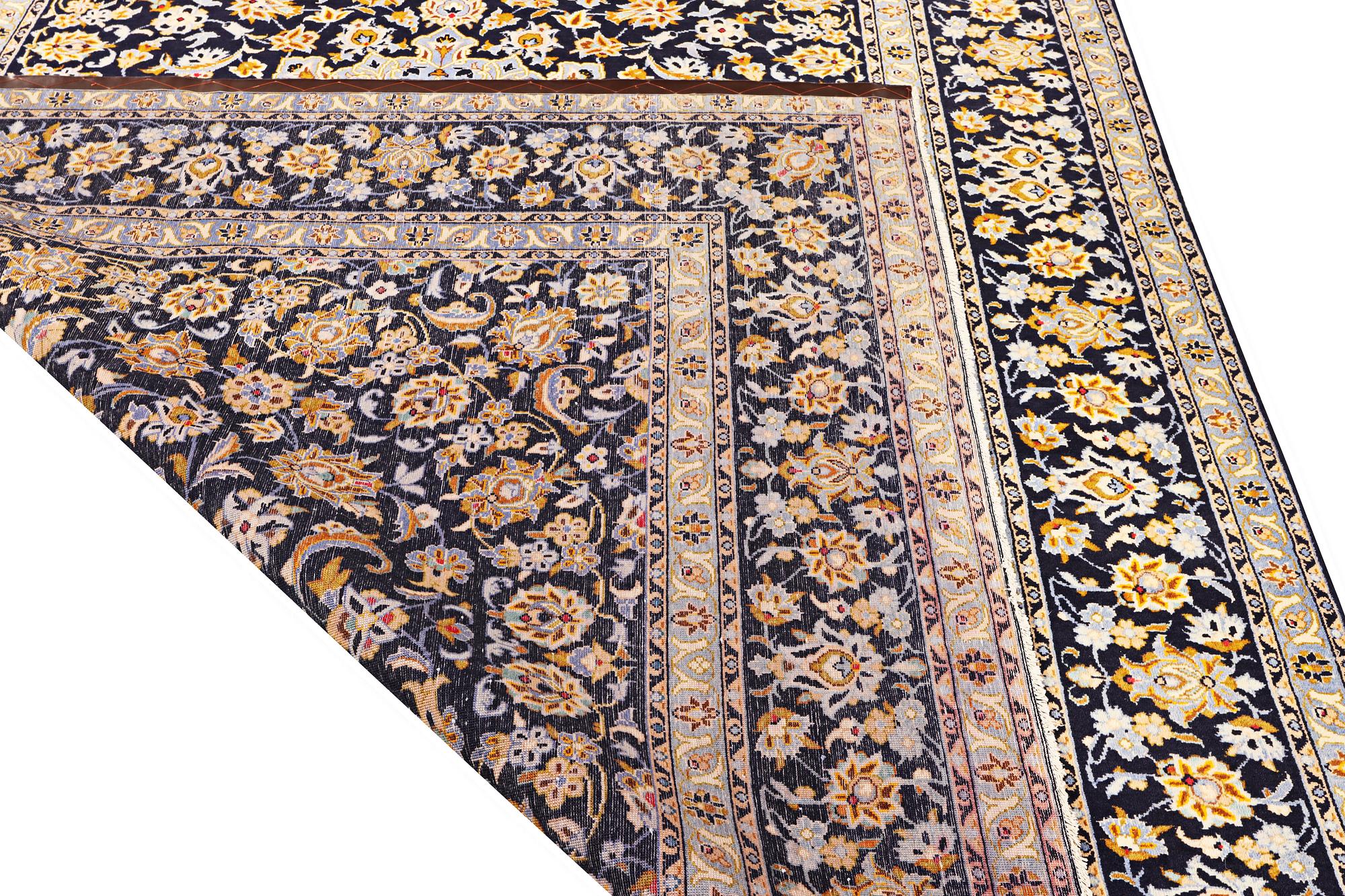 A Kashan carpet, a. 367 x 241 cm.