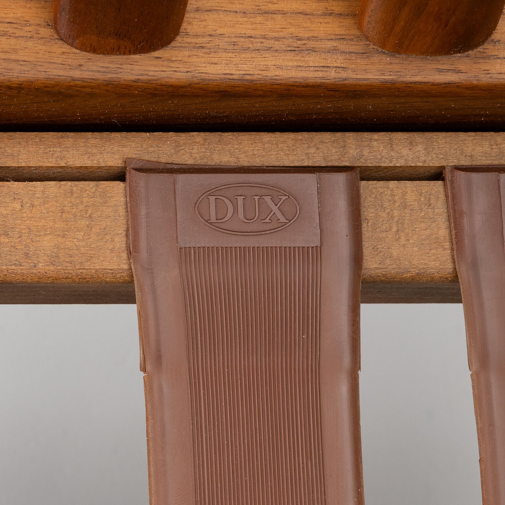 Folke Ohlsson, a pair of 'USA 75' armchairs, Dux, Sweden, 1960's.