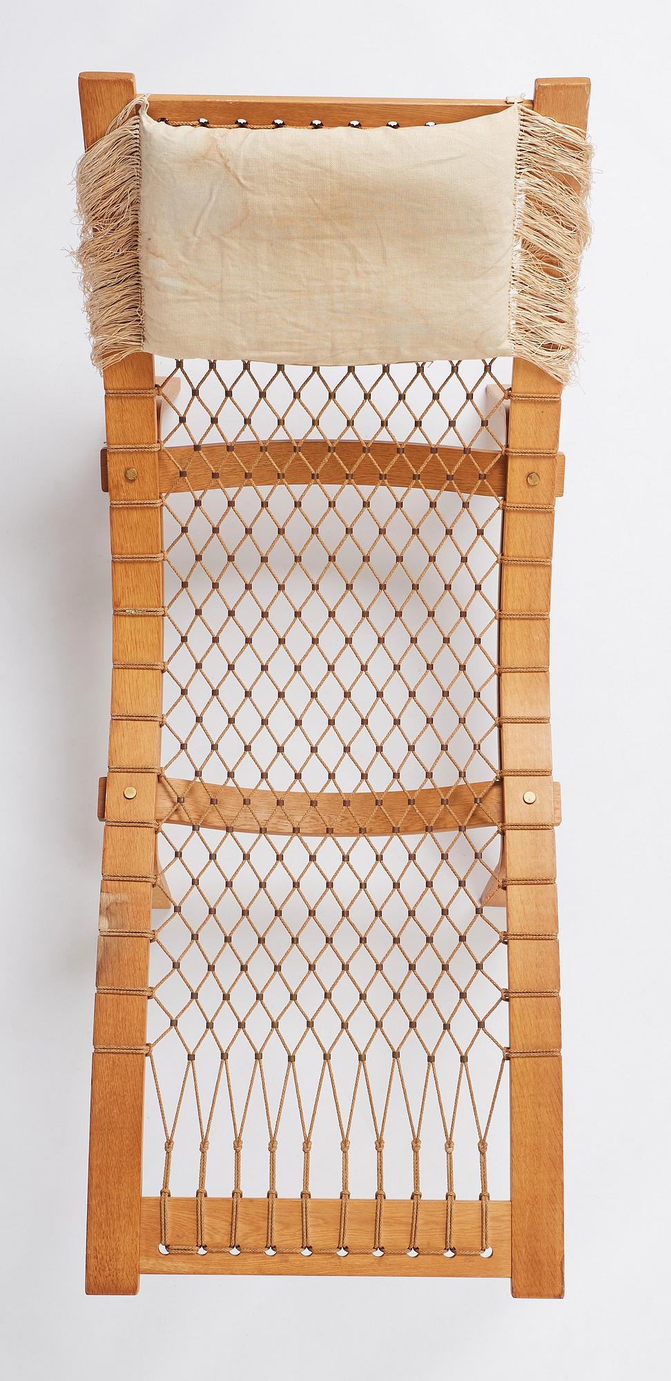 Hans J. Wegner, an oak chaise longue 'Hammock Chair GE2', Getama, Denmark, early 1960s.