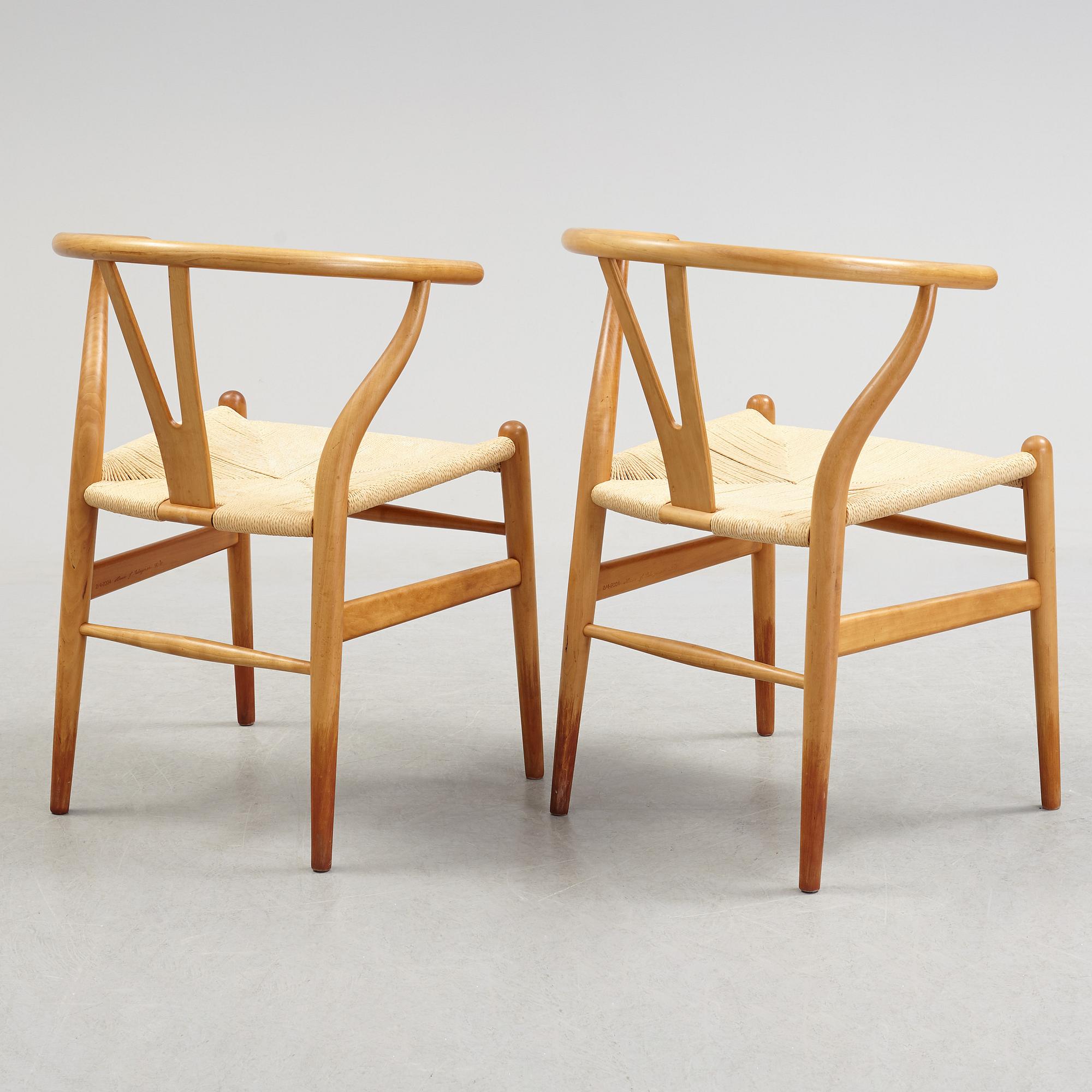 A set of four + two armchairs 'Y-chair' by Hans J Wegner, Carl Hansen & Son, Denmark.