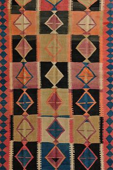 A carpet, kilim, ca 375 x 140 cm.