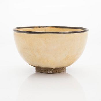 A creme glazed bowl, presumably Song/Yuan dynasty.
