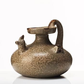 A olive green glazed wine jar, probably Jin/Six dynasties (265-420).