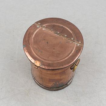 A copper water container, around the year 1900.