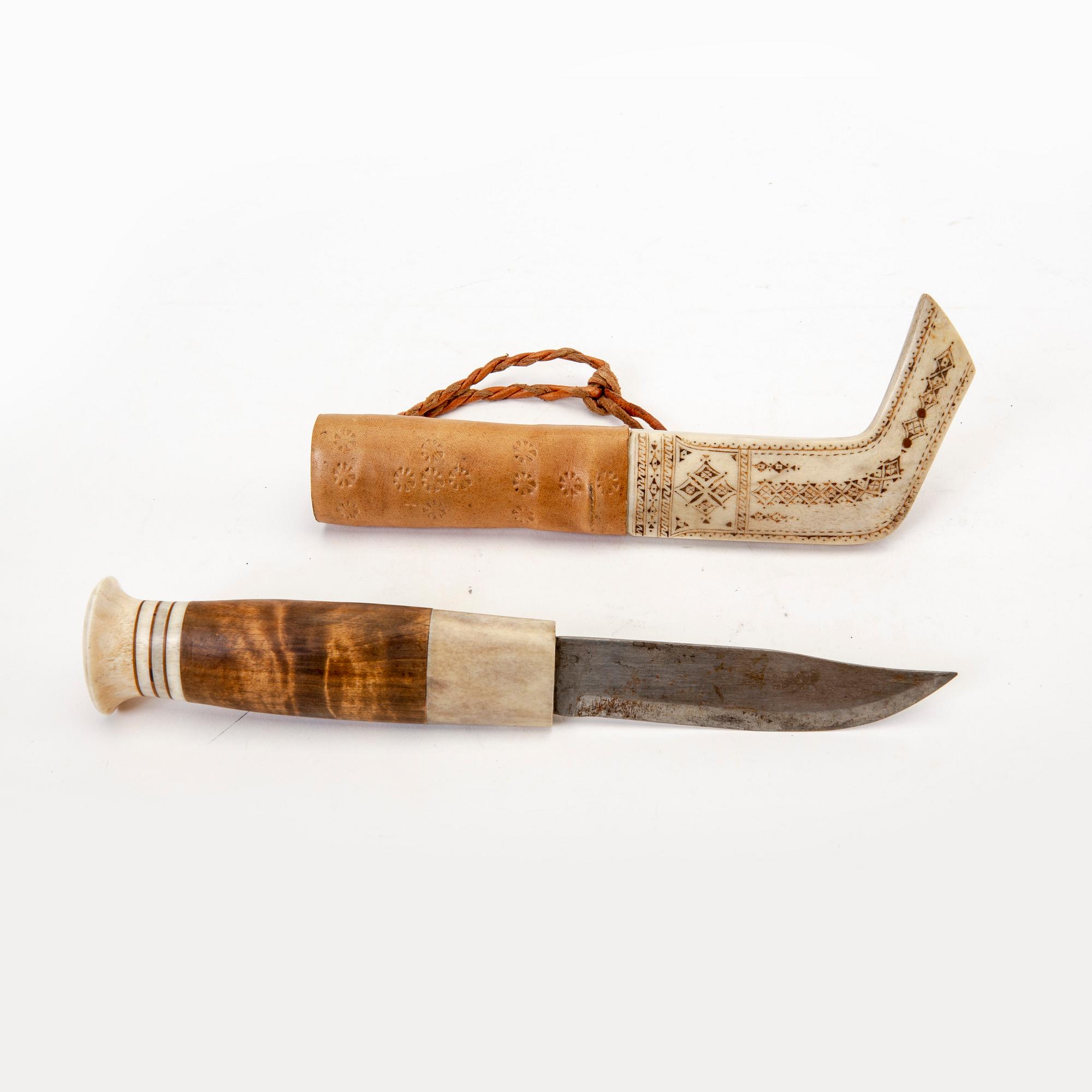 A reindeer horn, birch and leather knife by Per Sunna, signed.
