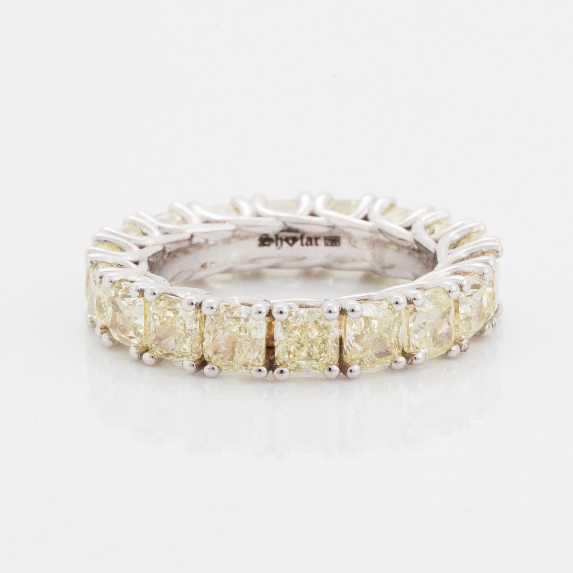 Cuschion-cut diamond eternity ring.