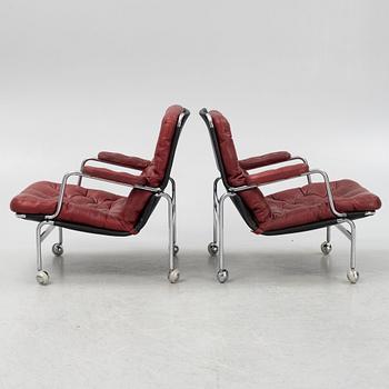 Bruno Mathsson, a pair of leather upholstered 'Karin 73' easy chairs from Dux.