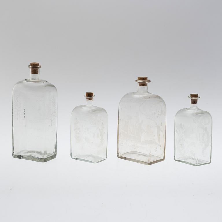 Four brandy bottles, 19/20th century.