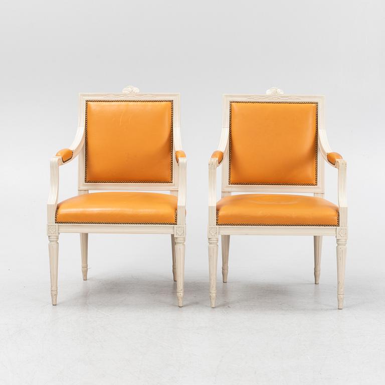 A pair of Gustavian style armchairs, end of the 20th Century.