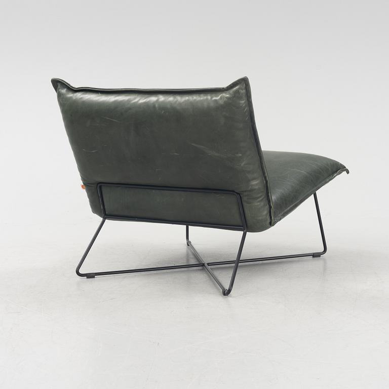 A contemporary lounge chair by Jess Design.