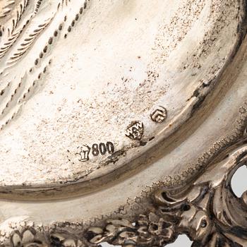 Two silver platters, presumably Wilhelm Weinranck, Hanau, and mock marks, Hanau, Germany, late 19th century.