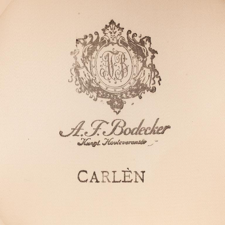 A.F. BODECKER, a black felt top hat.