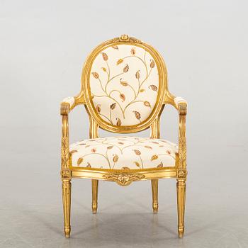 A Gustavian style armchair, 20th century.