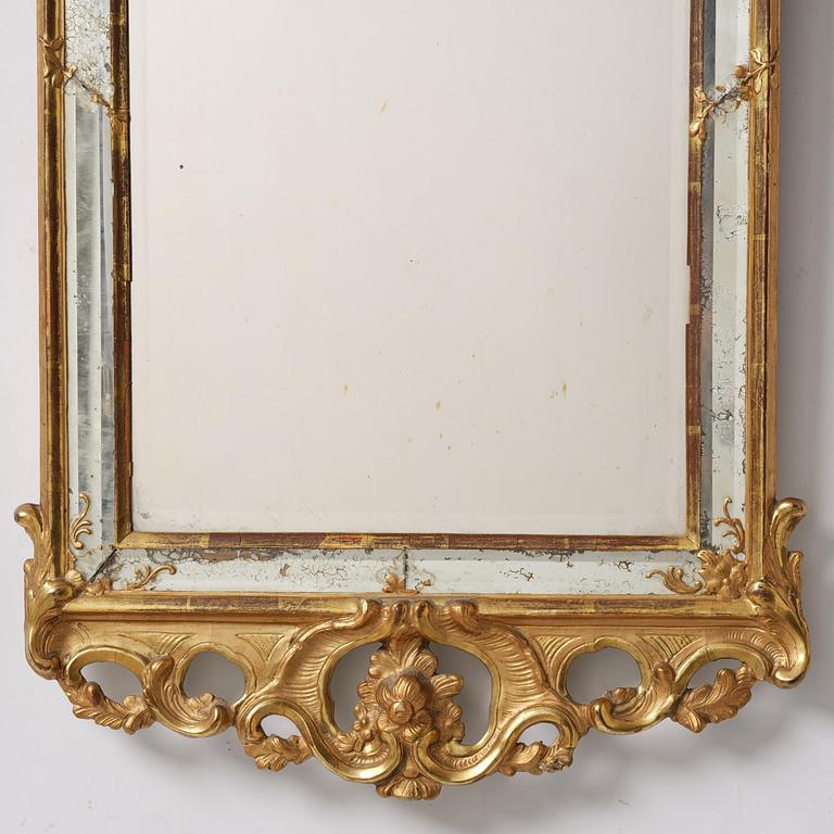 A rococo giltwood mirror, Stockholm, later part 18th century.