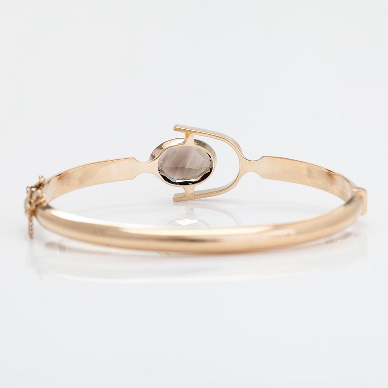 Eero Rislakki, a 14K gold and smoky quartz bracelet, Westerback, Helsinki 1960.