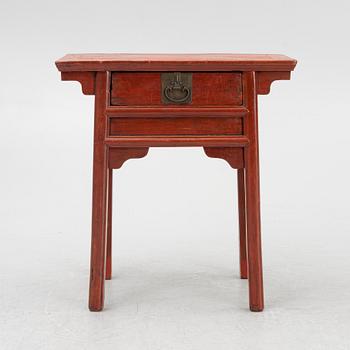 A red lacquered altar coffer, China 20th century.