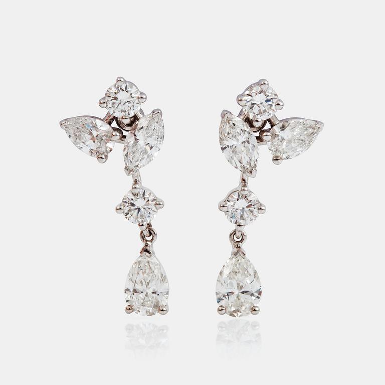 A pair of brilliant-, navette- and pear-cut diamond earrings. Signed Cartier. Total carat weight circa 3.70 cts.
