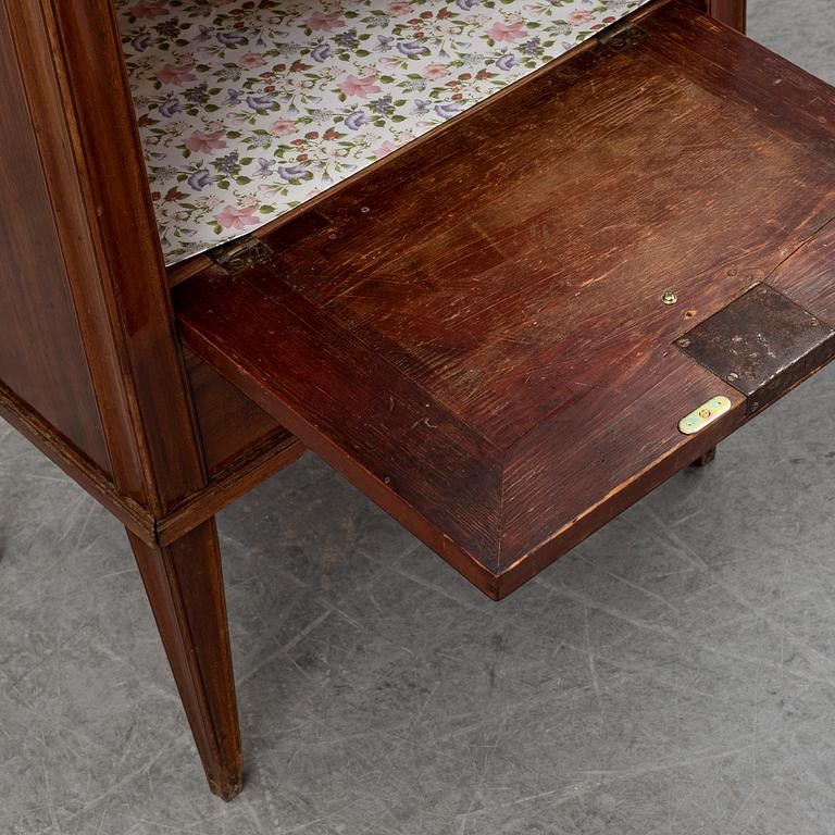 A Swedish late Gustavian mahogany with marble top bedside table, ca 1800.