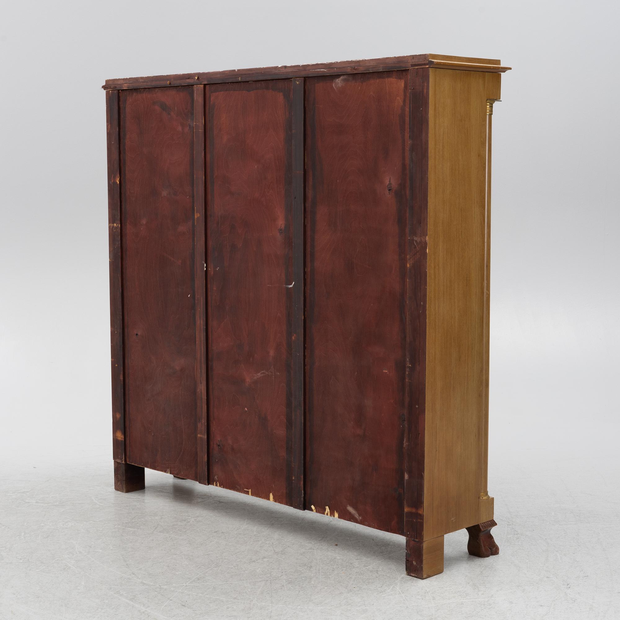 Bookcase, Empire style, first half of the 20th century.